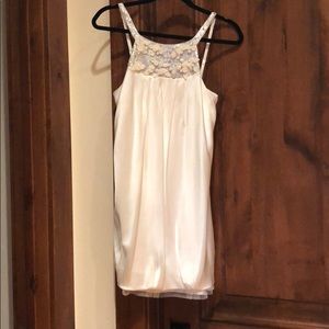 Cream satin-like dress with sequins on top half